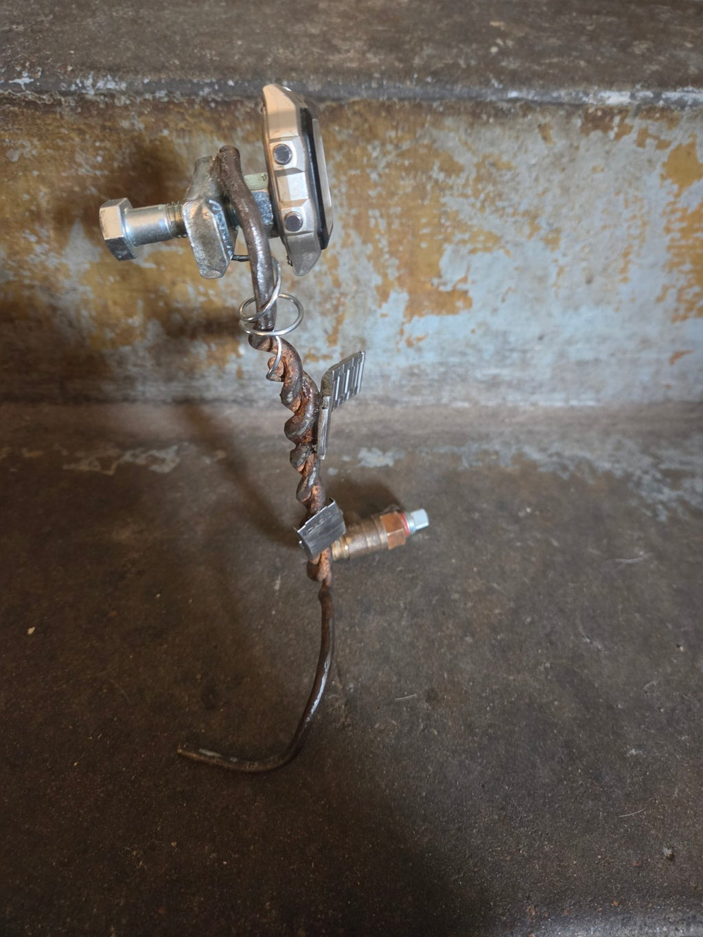 Handmade industrial watch sculpture opposite side view